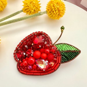Hand-embroidered brooch ‘’Red Apple". Handmade colorful pin brooch. Designer accessories.