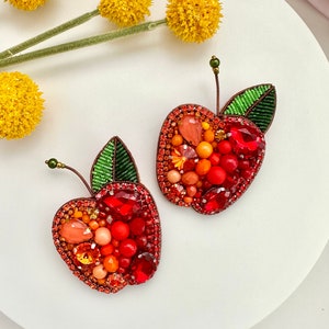 Hand-embroidered brooch ‘’Orange Apple". Handmade colorful pin brooch. Designer accessories.