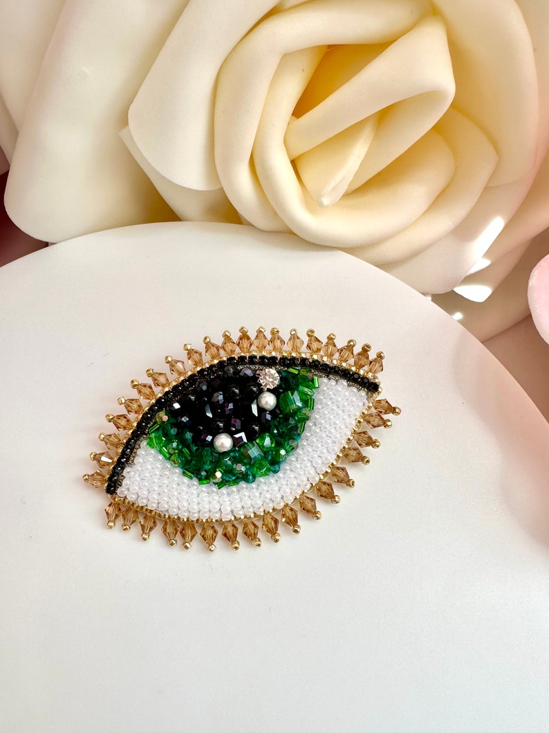Handmade Beaded Evil Eye Brooch: Green Crystal Design