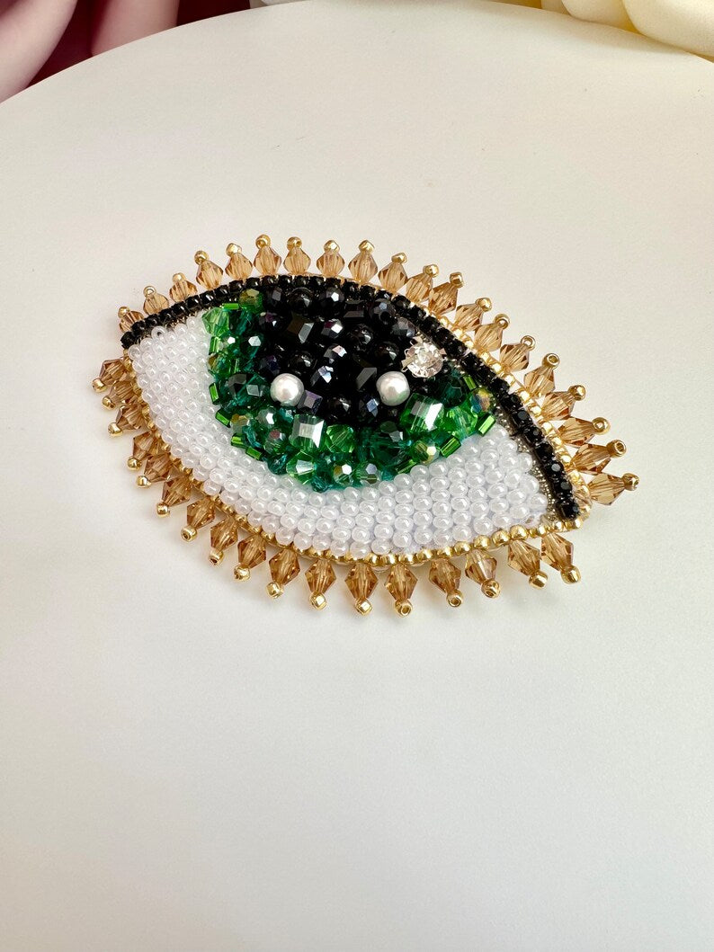 Handmade Beaded Evil Eye Brooch: Green Crystal Design