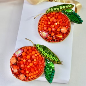 Hand-embroidered brooch ‘’Orange fruit". Designer handcrafted brooch.