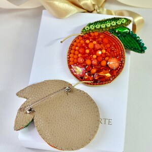 Hand-embroidered brooch ‘’Orange fruit". Designer handcrafted brooch.