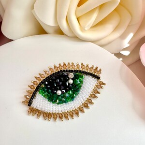 Handmade Beaded Evil Eye Brooch: Green Crystal Design