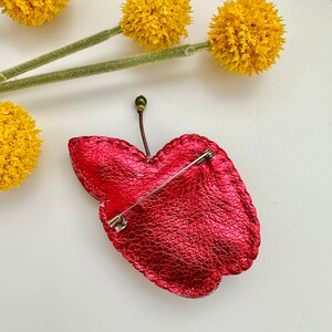 Hand-embroidered brooch ‘’Orange Apple". Handmade colorful pin brooch. Designer accessories.