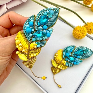 Beaded brooches Ukrainian Yellow Blue feather. Handmade designer brooch. High quality accessories. Unique design brooch.