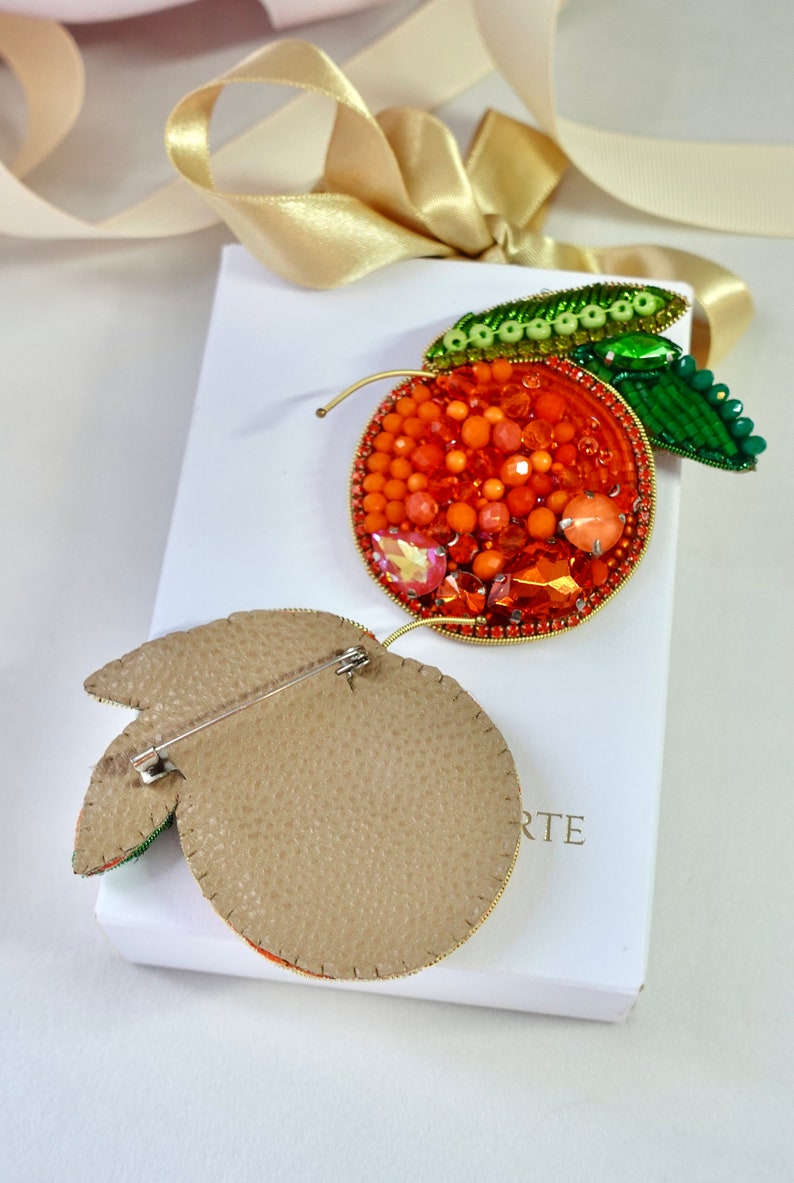 Hand-embroidered brooch ‘’Orange fruit". Designer handcrafted brooch.