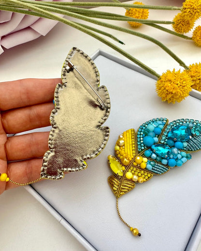 Beaded brooches Ukrainian Yellow Blue feather. Handmade designer brooch. High quality accessories. Unique design brooch.